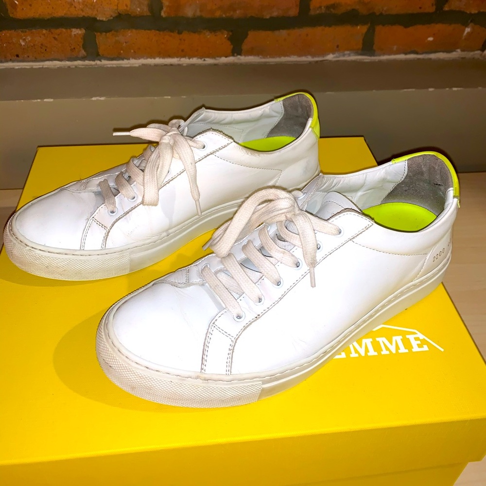 White common project sneakers with neon heel